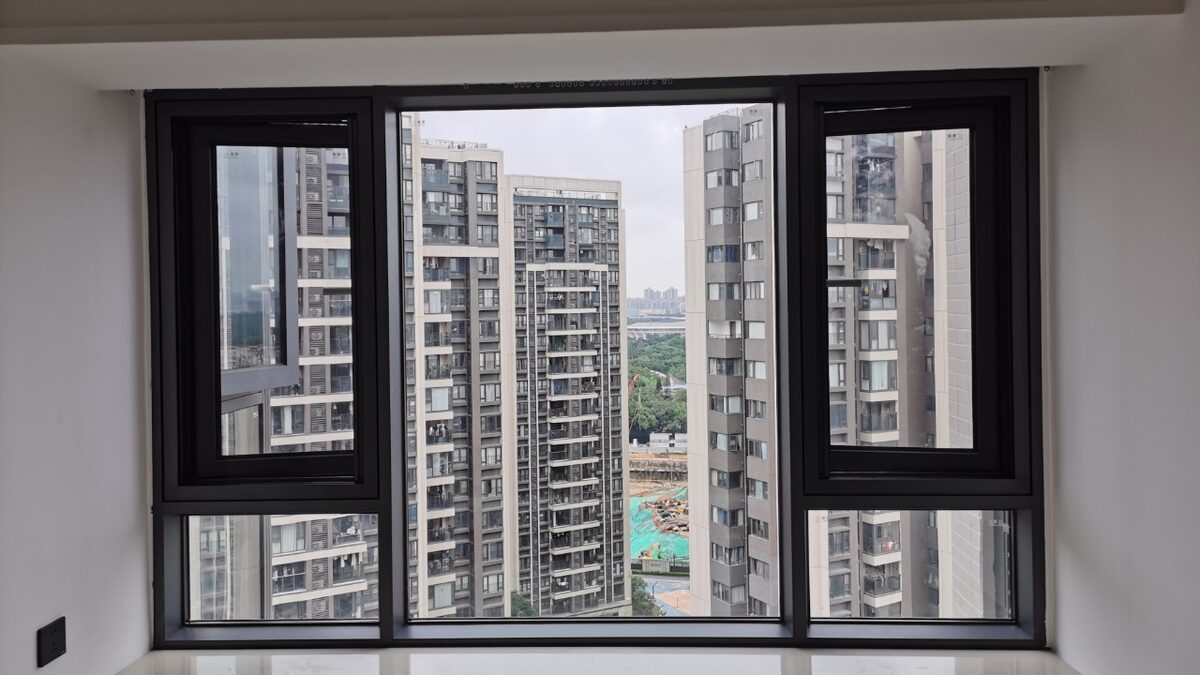 Dual open-out casement combination window in high-rise apartment