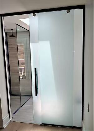 Bathroom suspended-track glass door with frosted glazing